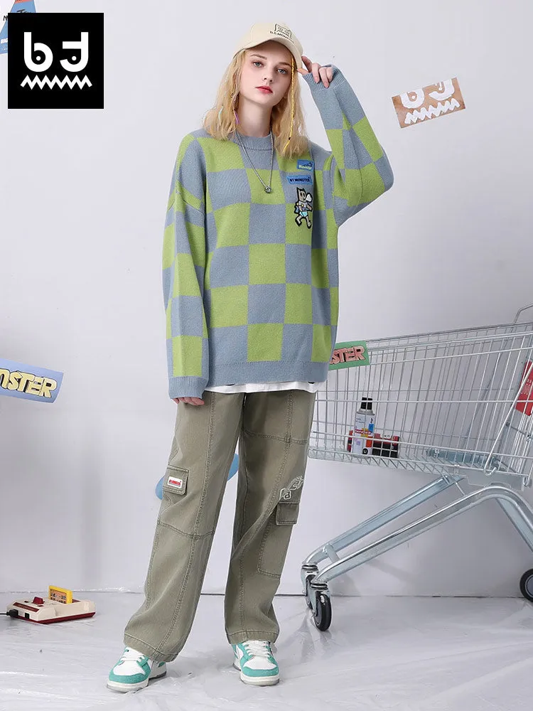 Color contrast patchwork plaid jacquard big-tooth monster graffiti embroider down shoulder sleeve sweater